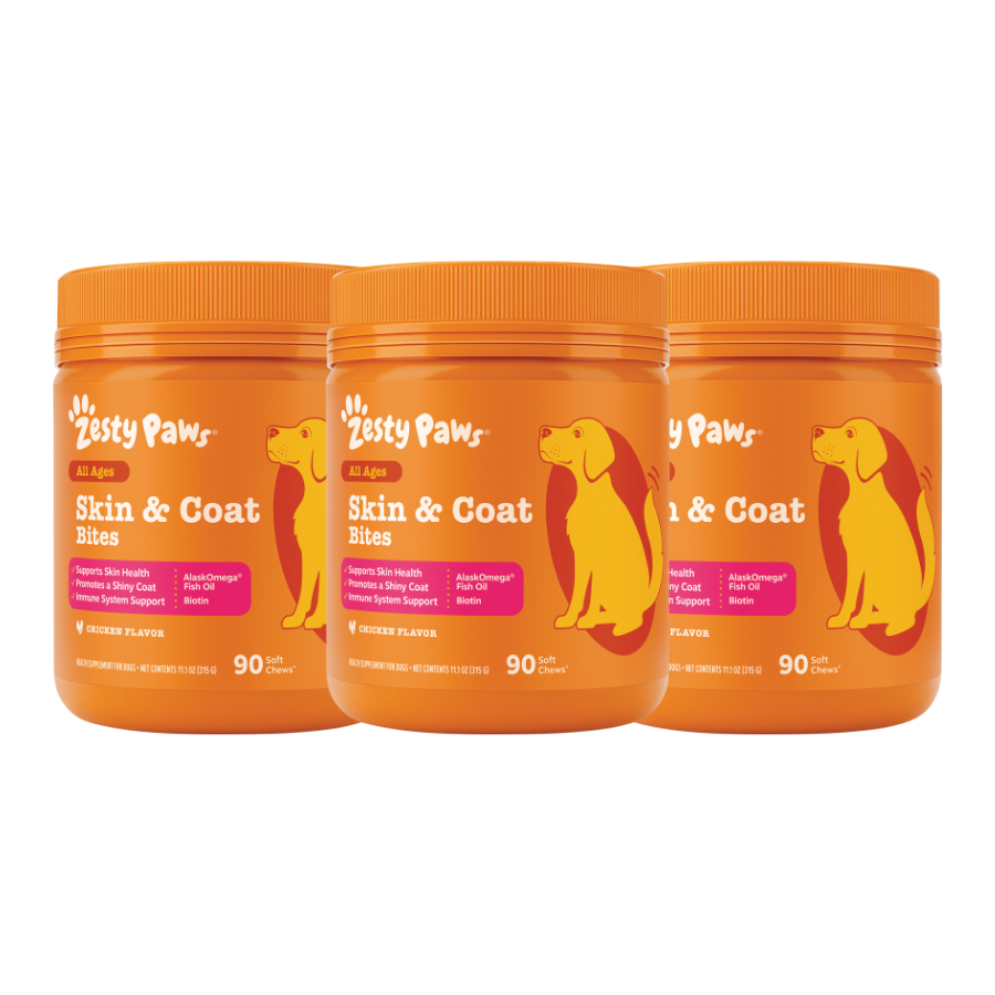 Three orange Zesty Paws Skin & Coat Bites jars with yellow dog silhouettes and chicken flavor label, 90 count each.