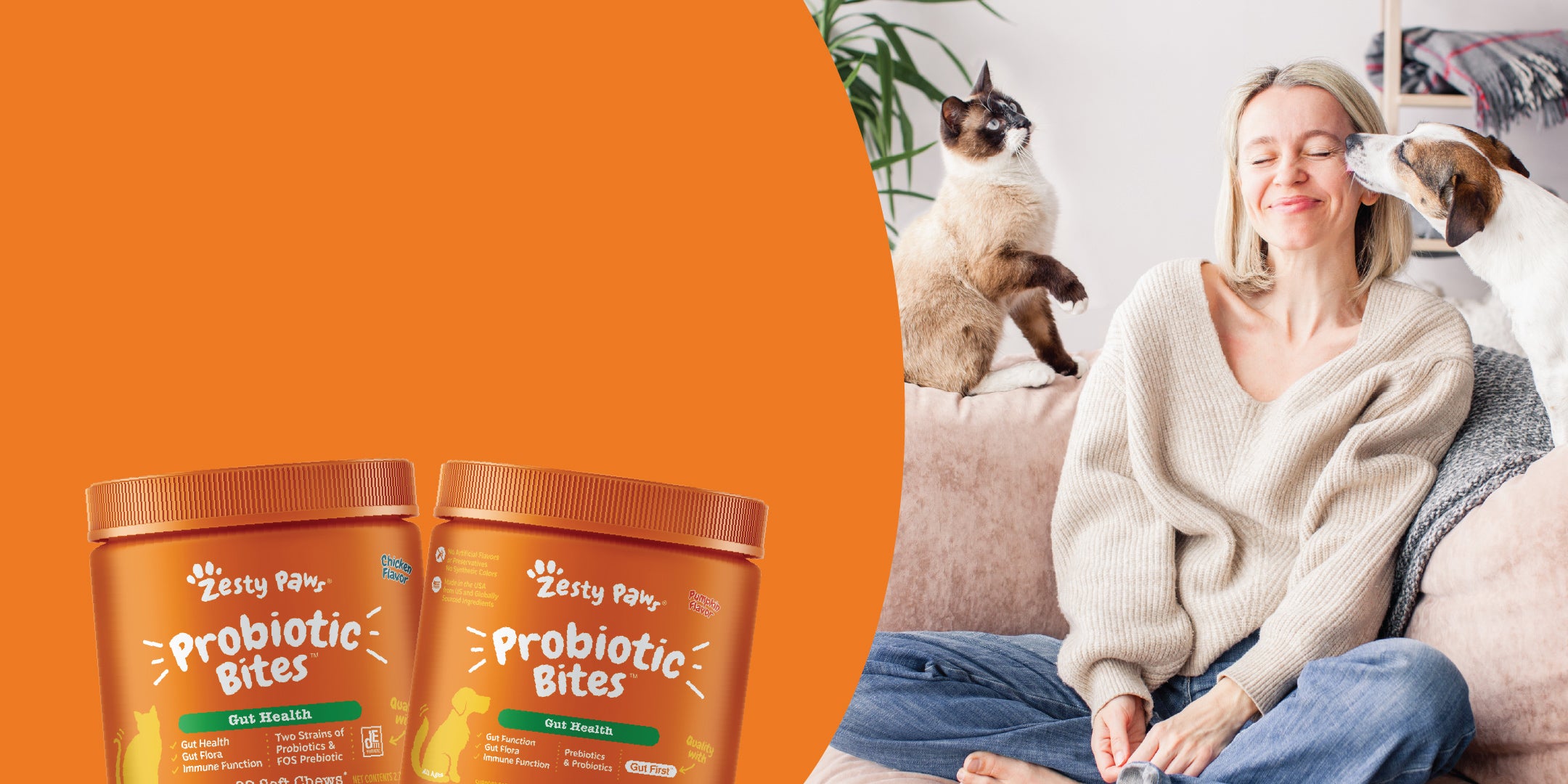 Two jars of Zesty Paws Probiotic Bites on an orange background with a woman and two dogs on a couch.