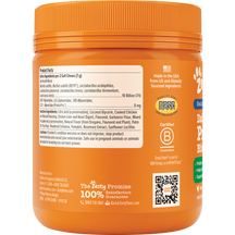 Orange plastic jar with ribbed cap containing probiotic dog treats, displaying product facts label and ingredient list on fro