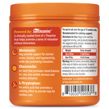 Orange jar of Calming Bites soft chews for cats with ingredient information and dosage instructions on label.