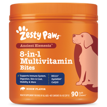 Orange plastic container of Zesty Paws Ancient Elements 8-in-1 Multivitamin Bites for dogs with brown labeling and illustrati