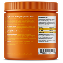 Orange plastic jar with ribbed lid containing soft chews for dogs, featuring ingredient information and dosage instructions o