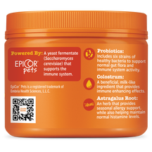 Orange plastic container with ridged lid containing dog supplement bites, labeled with ingredient information and QR code.