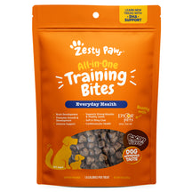 Orange Zesty Paw training bites package with bacon flavor, showing small brown treat pieces visible through clear window.