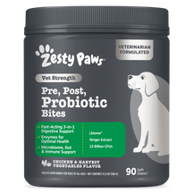 Dark gray jar of Zesty Paws Vet Strength Pre, Post, Probiotic Bites with white dog illustration and green label highlighting 