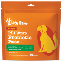 Orange Zesty Paws Pill Wrap Probiotic Paste pouch with yellow dog illustration and green benefits panel.