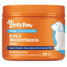 Orange jar of Zesty Paws 8-in-1 Multivitamin Bites for puppies with white paw logo and puppy illustration.