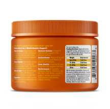 Orange plastic jar with orange ridged cap containing puppy multivitamin soft chews with feeding guidelines and ingredient inf