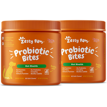 Two orange containers of Zesty Paw probiotic bites for dogs with white text and paw logo.