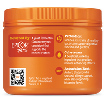 Orange jar with screw-top lid containing dog allergy and immune supplement with ingredient information printed on label.