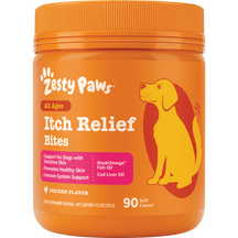 Orange jar of Zesty Paws Itch Relief Bites dog treats with yellow and red dog illustration and orange screw-top lid.