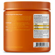 Orange jar of dog chew treats with ridged cap, ingredient and usage information label visible on front.