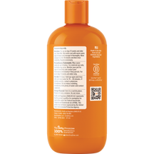 Orange plastic bottle of flea and tick shampoo for dogs with orange cap and white label with usage instructions.