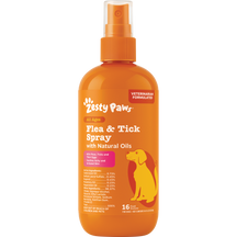 Orange spray bottle of Zesty Paws Flea & Tick Spray with natural oils and yellow dog silhouette on label.