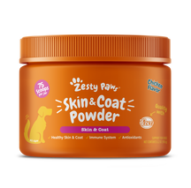 Orange jar of Zesty Paw Skin & Coat Powder for dogs with orange ridged cap and white text on label.
