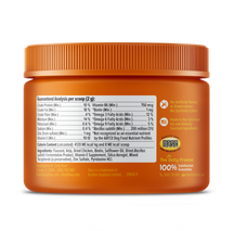 Orange plastic jar with ribbed cap containing dog supplement powder with nutrition label and ingredient information on front.