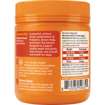 Orange jar with ribbed cap containing dental probiotic powder for dogs, labeled with ingredients and dosage instructions.