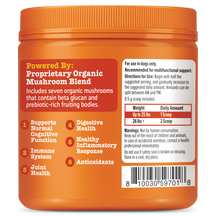 Orange jar of mushroom powder supplement for dogs with red and white label showing ingredient blend, usage directions, and do