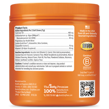 Orange plastic jar with ribbed lid containing dog supplement chews, displaying product facts label and ingredient information