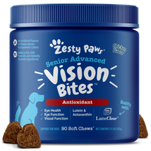 Blue jar of Zesty Paws Senior Advanced Vision Bites soft chews for dogs with brown treats displayed in front.