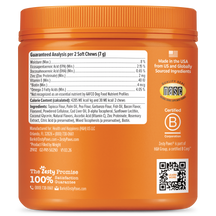 Orange jar of dog soft chew treats with nutrition label, ingredients list, and certification badges on container.