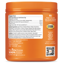 Orange jar of dog supplement soft chews with product facts label and ingredient list visible on front.