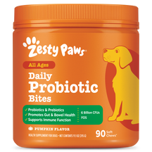 Orange jar of Zesty Paws Daily Probiotic Bites with yellow dog illustration, pumpkin flavor, 90 soft chews.