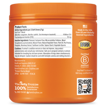 Orange plastic jar of probiotic dog bites with white product facts label and ingredient information.