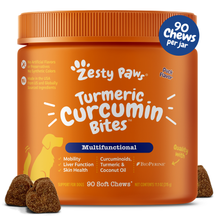 Orange jar of Zesty Paw turmeric curcumin bites for dogs with duck flavor, 90 soft chews, brown treat pieces displayed in fro