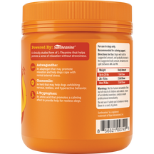 Orange jar with orange ridged lid containing dog calming bites, displaying ingredient information and dosage instructions on 