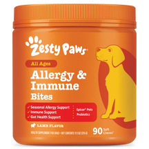 Orange container of Zesty Paws Allergy & Immune Bites dog supplement with yellow dog illustration and product details on labe