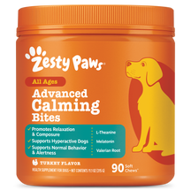 Orange Zesty Paws bottle containing Advanced Calming Bites for dogs with yellow dog illustration and teal ingredient panel.