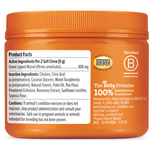 Orange jar with ribbed cap containing dog supplement soft chews with product facts and ingredient labels visible.