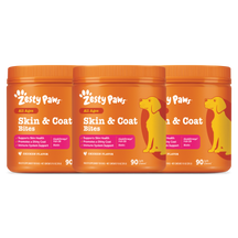 Three orange Zesty Paw Skin & Coat Bites jars with chicken flavor, 90 soft chews each, displayed side by side.