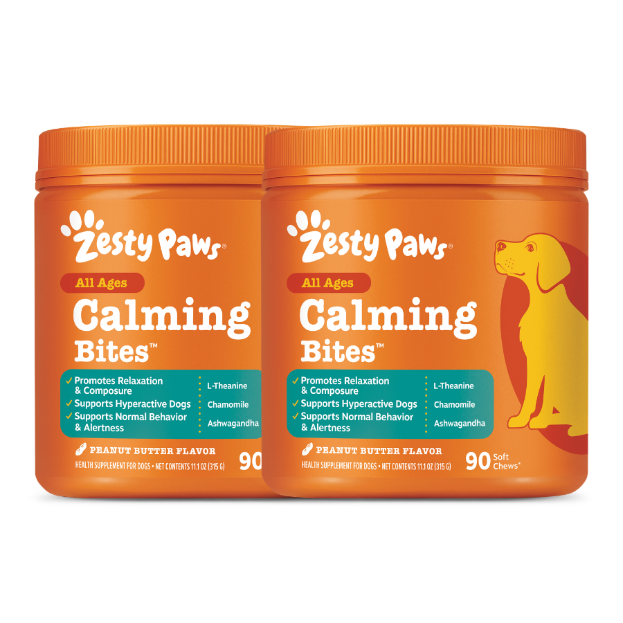 Two orange Zesty Paws Calming Bites containers with peanut butter flavor, featuring a yellow dog illustration and product det