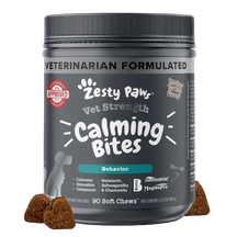 Zesty Paw Vet Strength Calming Bites jar with gray label and three brown soft chew treats displayed in front.