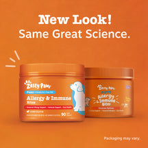 Two orange bottles of Zesty Paws Puppy Allergy & Immune Bites with lamb flavor labeling on orange background.